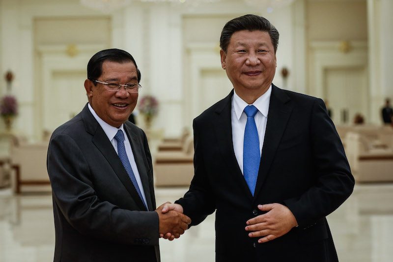 Prime Minister Hun Sen, left, greets Chinese President Xi Jinping last Thursday in Phnom Penh. (Pring Samrang/Reuters)