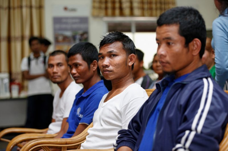 Four men who were held hostage by Somali pirates for nearly five years sit at a press conference in Phnom Penh on Tuesday. (Siv Channa/The Cambodia Daily)