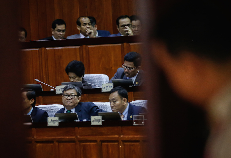 Opposition lawmakers, seated in the front two rows, attend a session of the National Assembly in Phnom Penh on Tuesday. (Siv Channa/The Cambodia Daily)