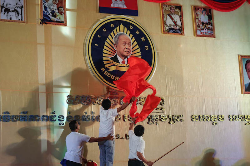 Funcinpec members unveil the party’s new logo, featuring the face of Prince Norodom Ranhariddh, at a party congress in Phnom Penh on Friday, in a photograph posted to the prince’s Facebook page.