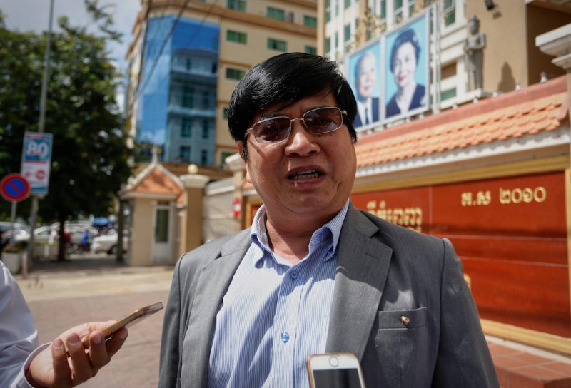 Som Soeun speaks with reporters outside the Phnom Penh Municipal Court on Tuesday after winning his lawsuit. (Siv Channa/The Cambodia Daily)