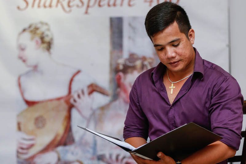 Poet Choun Sopheap rehearses the reading of a Shakespeare sonnet in Khmer, at Phnom Penh’s Meta House on Wednesday. Siv Channa/The Cambodia Daily