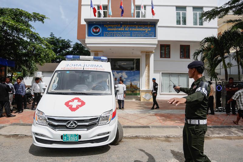 An ambulance arrives at the Cambodian National Center for Peacekeeping Forces headquarters in Phnom Penh on Thursday morning. (Siv Channa/The Cambodia Daily)
