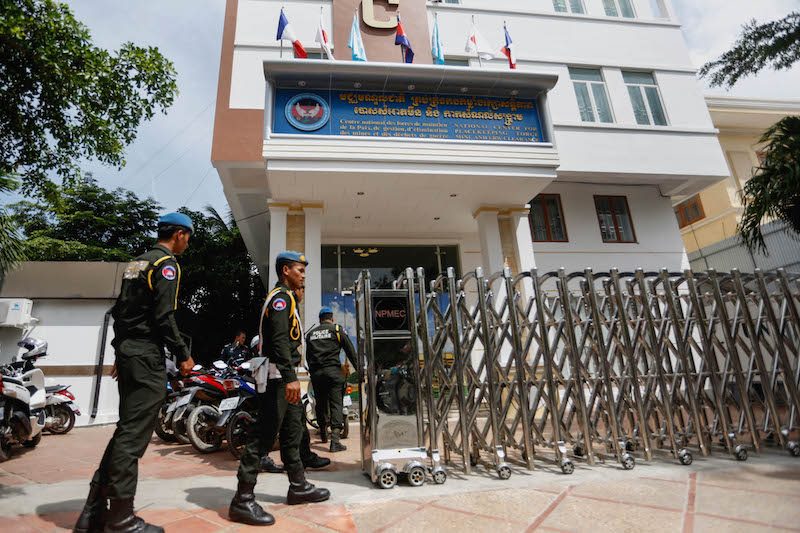Military police guard the entrance to the Cambodian National Center for Peacekeeping Forces headquarters in Phnom Penh on Thursday. (Siv Channa/The Cambodia Daily)