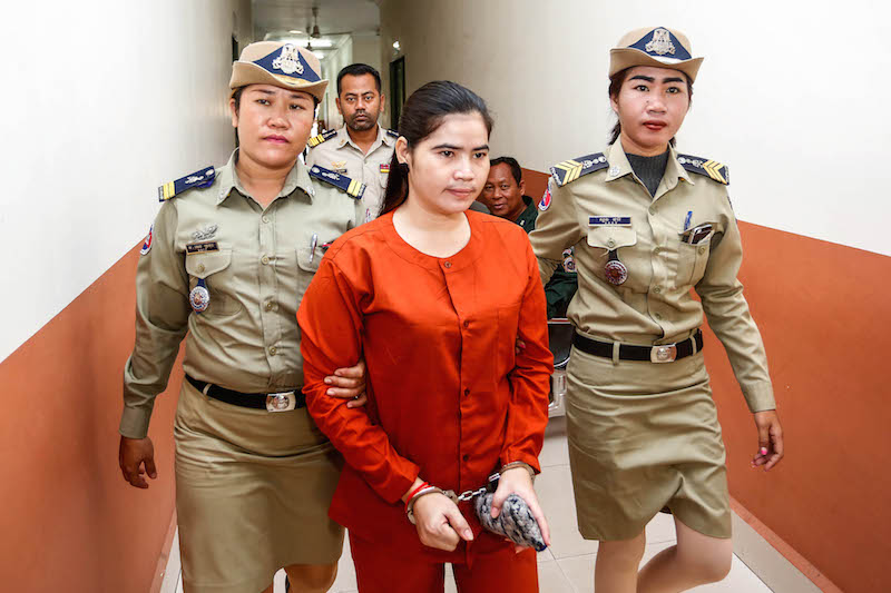 Boeng Kak activist Tep Vanny is led away after a hearing at the Court of Appeal in Phnom Penh last week. (Siv Channa/The Cambodia Daily)