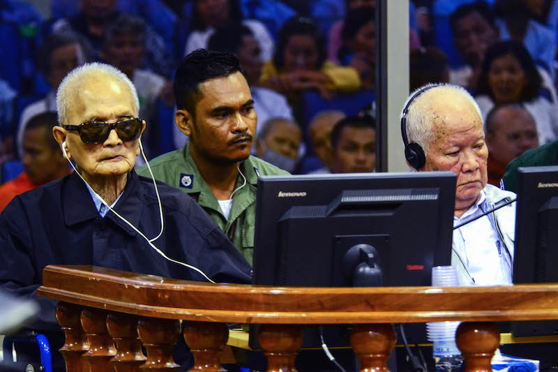 Nuon Chea, left, and Khieu Samphan await the announcement of their appeal verdict at the Khmer Rouge tribunal in Phnom Penh on Wednesday. (ECCC)