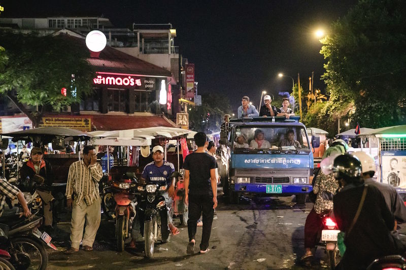 A City Hall truck moves through traffic along Phnom Penh's riverside on Monday night. (Nick Sells Photography)