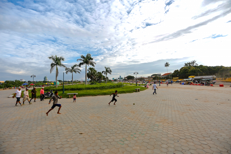 Children play at a park along National Road 5 in Phnom Penh’s Russei Keo district on Tuesday, to where Freedom Park may be relocated. (Siv Channa/The Cambodia Daily)
