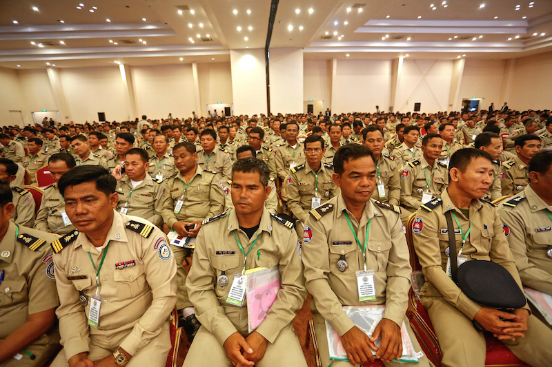 Commune police officers from around the country gather on Tuesday at a meeting in Phnom Penh presided over by Interior Minister Sar Kheng. (Siv Channa/The Cambodia Daily)