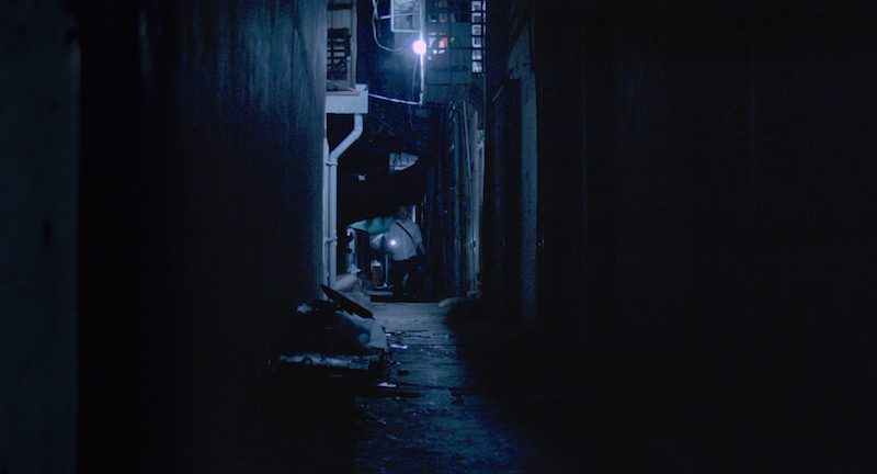 A Phnom Penh neighborhood alley shown in the film Waxing Moon. e