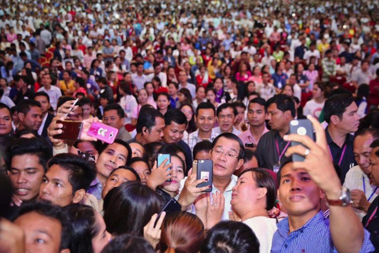 In Charm Offensive, Hun Sen Promises Workers Raises, Pension