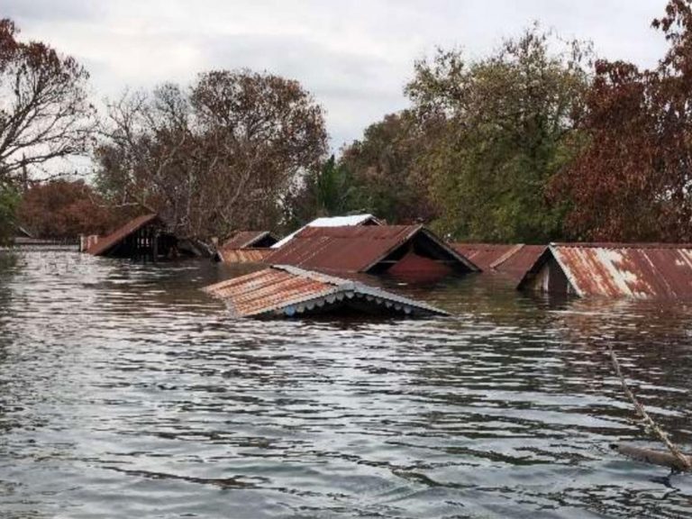 ‘Silent waterworld’: Cambodian village submerged by floodwater from Chinese-built dam