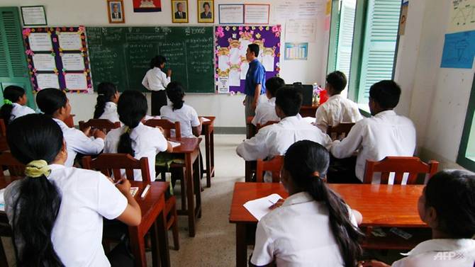 Cambodian schools told to stop improvising bells from war-era bombs