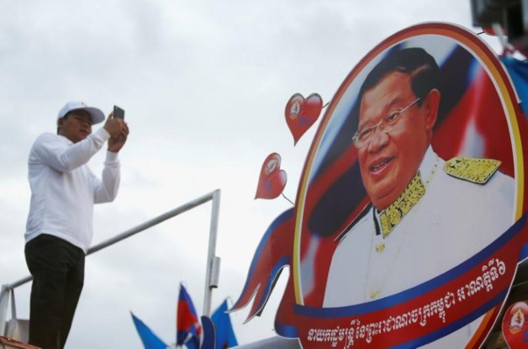 Cambodian security forces overstep neutrality rules in election campaign, rights group says