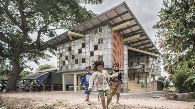Cambodian school has a gridded facade that doubles as a jungle gym