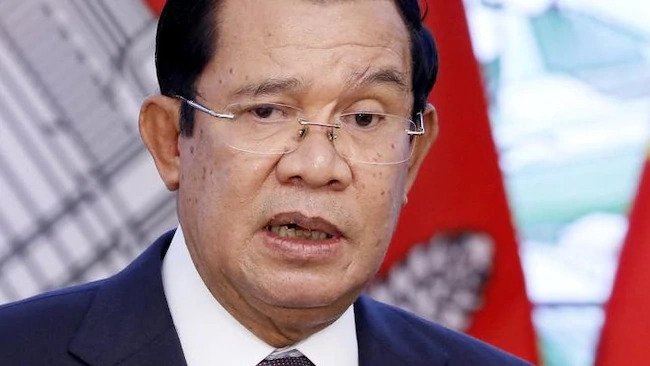 Cambodia PM threatens on opposition return