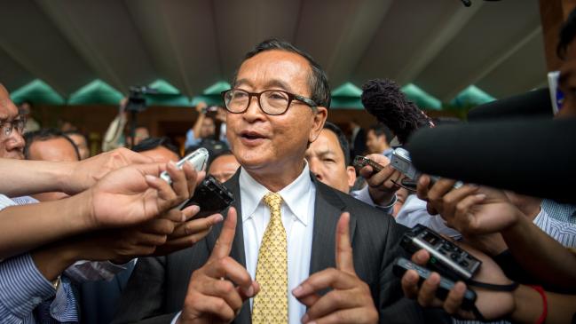 Exiled Cambodian Sam Rainsy has vowed to meet machine guns and lead a revolution