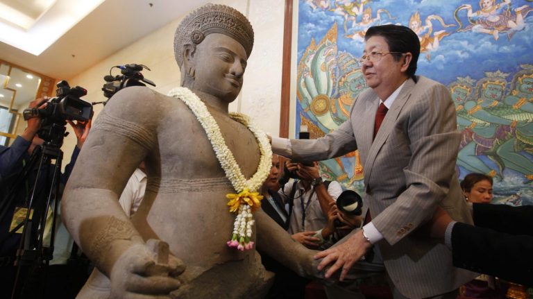 International art expert charged with selling looted Cambodian antiquities for the past 50 years