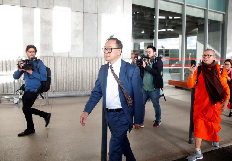 Self-exiled Cambodian opposition figure boards flight from Paris