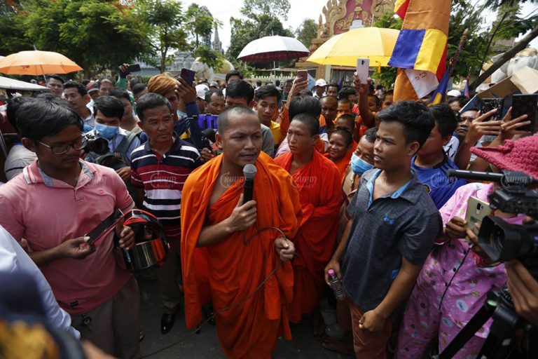 Hundreds block national road to demand return of pagoda land