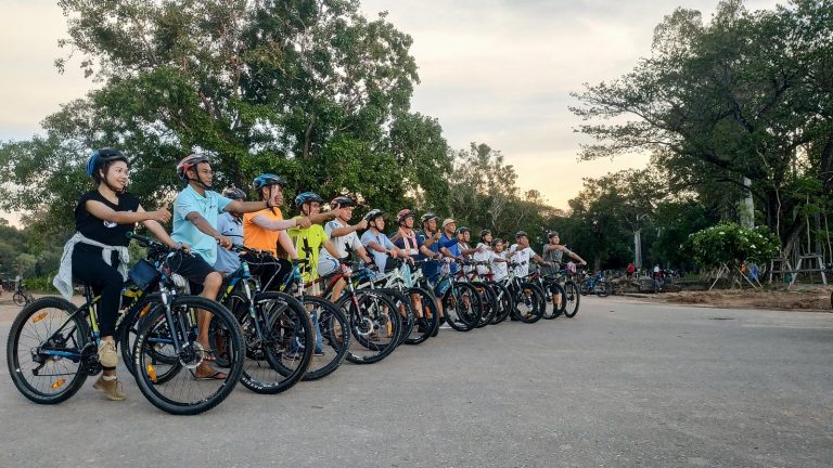 In Siem Reap, locals take to two wheels to escape virus monotony