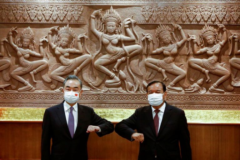 China’s Wang Yi offers aid and vaccines to ally Cambodia
