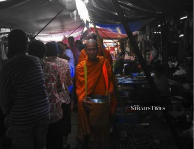Cambodia bans monks from collecting alms in crowded public places