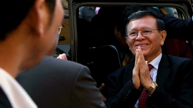 Cambodia opposition leader calls for treason charges to be dropped as trial resumes