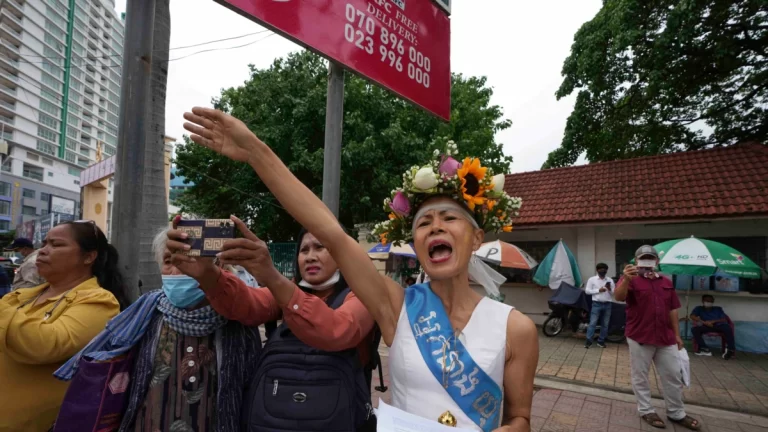 Cambodian dissident dresses up as ‘Lady Justice’ for trial