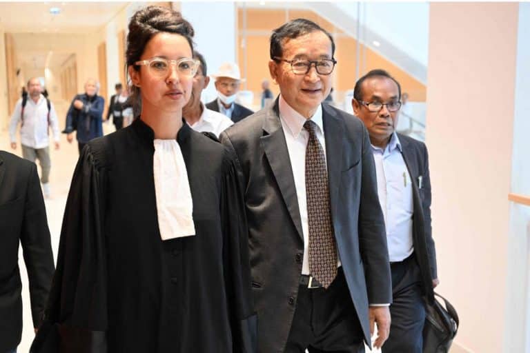 Cambodian dissident fights defamation claims at French trial after complaints from Hun Sen and son