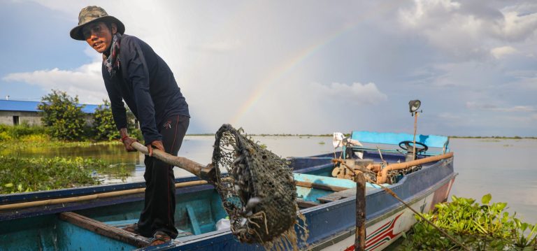 Crackdowns and ecological collapse drive fishers from Tonle Sap Lake
