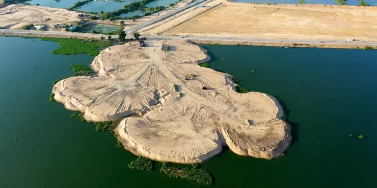 Filling Cambodian lakes with sand creates pricey new land. It also displaces families. (video)