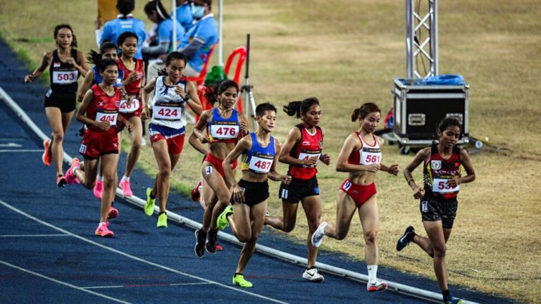 Rain-sodden Cambodian badly loses race, but wins hearts