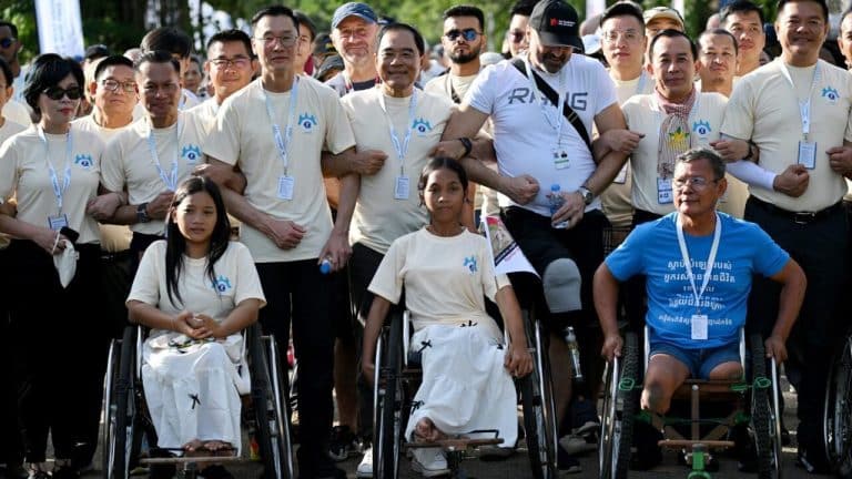 Survivors, sniffing dogs join anti-mine march at Cambodia’s Angkor Wat