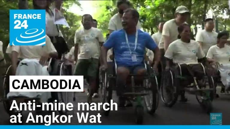 Survivors, sniffing dogs join anti-mine march at Cambodia’s Angkor Wat
